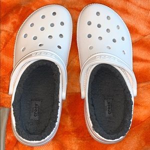 White Fur Crocs. Size 7 in men and 9 in women.